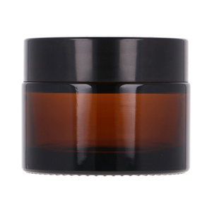 Brown glass jar 50 ml, ABS black cap, PP white overlay